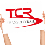 TCR North logo on white banner being held in hands